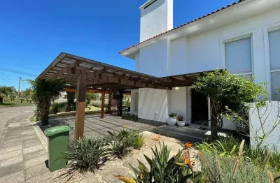 Sobrado à venda, 4 quartos, 4 suítes, 2 vagas, condomínio green village - xangri-lá/rs