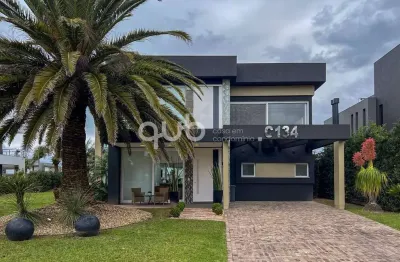 Sobrado à venda, 4 quartos, 4 suítes, 2 vagas, condomínio enseada lagos de xangri-lá - xangri-lá/rs