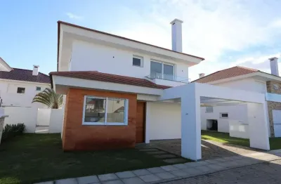Sobrado à venda, 4 quartos, 4 suítes, 2 vagas, condomínio green village - xangri-lá/rs