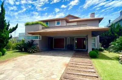 Sobrado à venda, 4 suítes, 2 vagas, condomínio playa vista - xangri-lá/rs