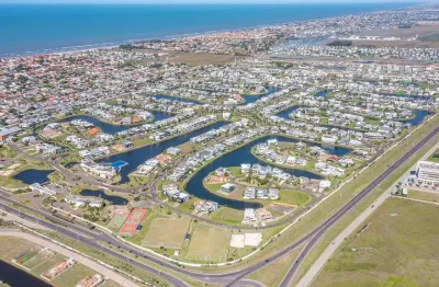 Terreno à venda, condomínio enseada lagos de xangri-lá - xangri-lá/rs