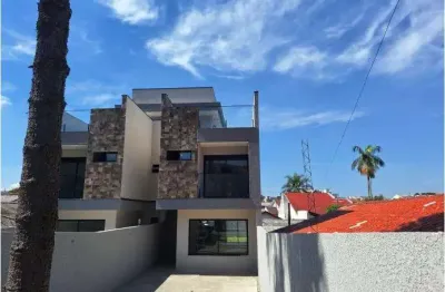 Sobrado no xaxim com quintal na frente e fundos, próximo à avenida david tows