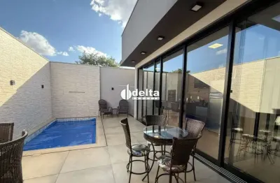Casa mobiliada em condomínio disponível para locação no bairro laranjeiras em uberlândia-mg.