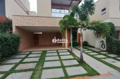 Casa em condomínio com 4 suítes disponível para locação no bairro aclimação em uberlândia-mg