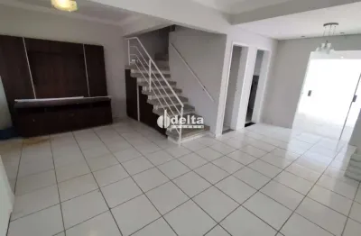 Casa em condomínio com 03 quartos sendo 1 suíte, disponível para locação no bairro morada da colina em uberlândia-mg