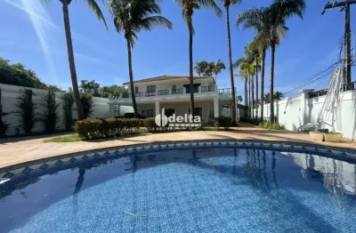 Casa residencial com 4 suítes, bairro morada da colina - uberlândia