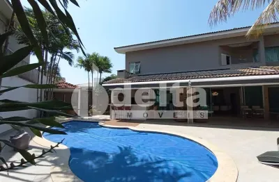 Casa em condomínio com 4 suítes disponível para locação no bairro morada da colina em uberlândia - mg.