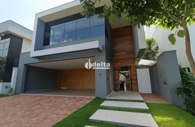 Casa em condomínio com 3 suítes disponível para locação no bairro shopping park em uberlândia - mg.