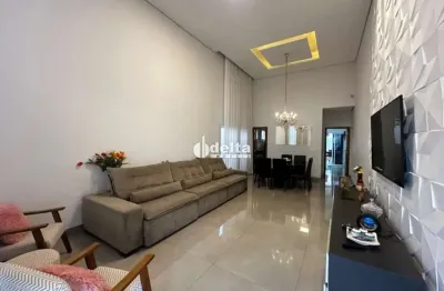 Casa residencial com 3 suítes disponível para locação e venda no bairro jardim inconfidência em uberlândia - mg.