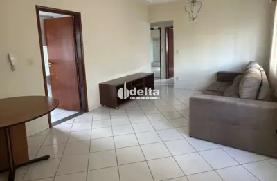 Apartamento semi mobiliado com 3 quartos sendo 1 suíte, disponível para locação no bairro Santa Mônica em Uberlândia-MG