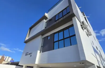 Apartamento térreo com área no bessa com 2 quartos sendo 1 suíte