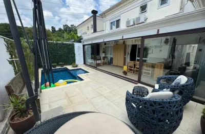 Casa à venda no tamboré 7, 240m², 3 suítes, piscina aquecida, gourmet, escritório, lareira, segurança, condomínio exclusivo alphaville.