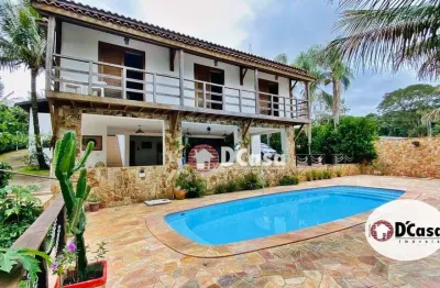 Casa a venda no condomínio chácaras cataguá, com área total de 2201m2, 4 quartos e ampla área gourmet com piscina, taubaté-sp.
