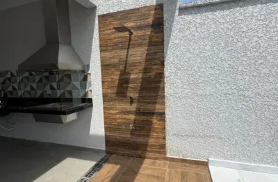 Casa no balneário são joão batista em peruíbe com piscina, área gourmet e suíte a 800m da praia