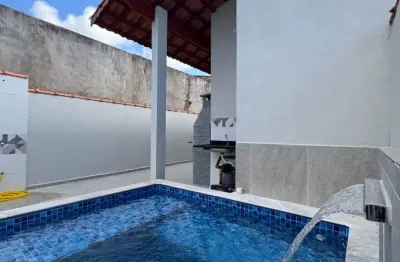 Casa no bairro loty em itanhaém, lado praia a 1000m do mar com 02 dormitórios (1 suíte), piscina, área gourmet e financiamento bancário disponível