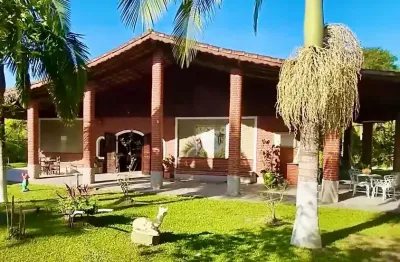 Chácara completa com 3 casas, piscina com sauna, lago e energia solar no armando cunha – peruíbe