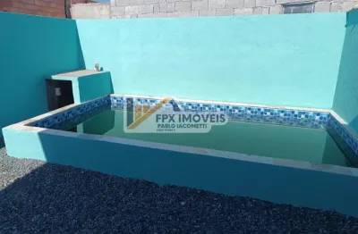 Casa na praia com piscina em itanhaém por r$ 220.000,00