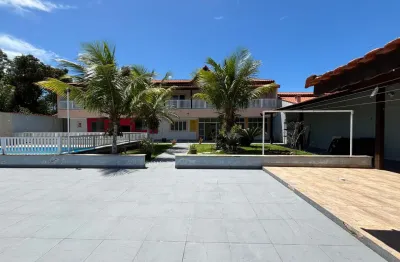 Casa lado a praia a 2000 metros do mar, espaço gourmet com churrasqueira, piscina grande e vaga para 10 carros