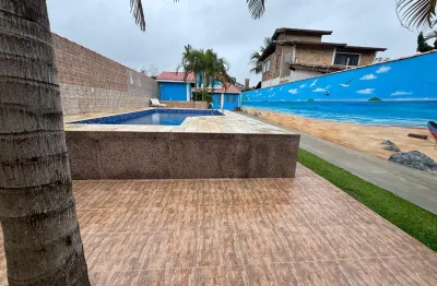 Casa lado da praia a 600 metros do mar com 3 quartos suites e area gourmet possuindo churrasqueira e piscina