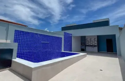 Casa localizada lado praia a 1000 metros do mar com 2 quartos em rua pavimentada, area gourmet com piscina e churrasqueira