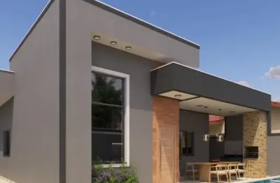 Casa localizada lado praia a 590 metros do mar em rua calçada com 2 quartos sendo 1 suíte, possui area gourmet com churrasqueira, piscina, jardim, area de serviço, lavabo e pé direito duplo