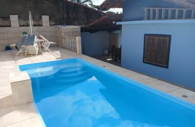 Casa localizada lado praia no Cibratel 2, Itanhaém, a 1 km do mar, com 3 dormitórios, 2 banheiros, 1 sala, 1 cozinha, 3 vagas de garagem, piscina, área gourmet e churrasqueira – Escritura
