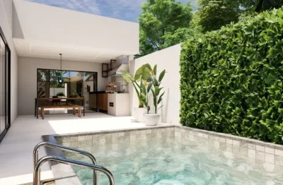 Casa localizada lado praia a 100 metros do mar em rua asfaltada, com 3 quartos (sendo 1 suíte), possui area gourmet com churrasqueira, piscina, lareira e jardim