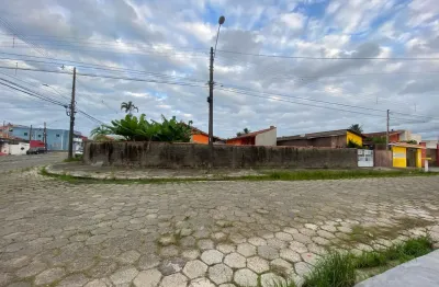 Terreno localizado lado praia a 1400 metros do mar em rua calçada - Escritura