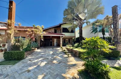 Casa em condomínio fechado localizada lado praia a 400 metros do mar, com 4 quartos suítes, possui area gourmet com churrasqueira e piscina - Escritura