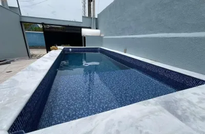 Casa na praia com 3 quartos, piscina e área gourmet em itanhaém.