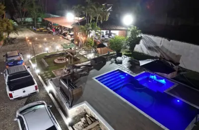 Chácara com piscina, 3 quartos, área gourmet e lago em itanhaém.