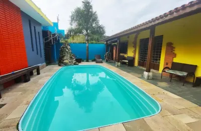 Casa à venda com piscina, área gourmet e sala de jogos, no bairro jardim jamaica
