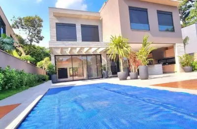 Belíssima casa nova com 4 suítes, área gourmet, sauna, piscina, semi-mobiliada