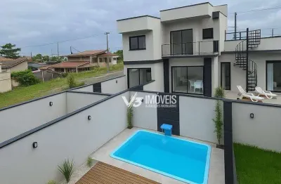 Triplex com vista para o mar e para as montanhas, com 3 suítes e 2 churrasqueiras em ambientes diferentes.