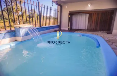 Casa de 03 dormitórios sendo 01 suíte com piscina aquecida no bairro desvio rizz
