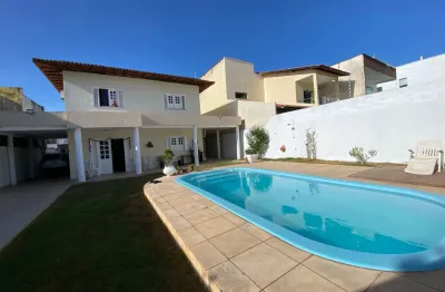 Casa duplex solta lado praia — 5 quartos, piscina e conforto absoluto | venda