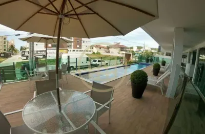 Apartamento todo mobiliado com 2 quartos próximo a praia de palmas a venda