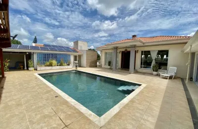 Parque da fazenda - at 1.230m² - ac 700m² - 4 suítes - 6 vagas - piscina