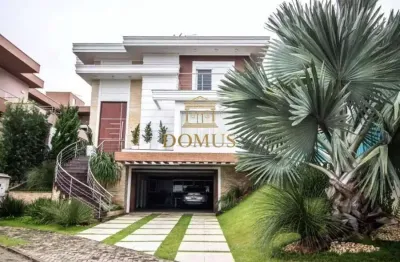 Casa em condomínio fechado com 4 quartos à venda na avenida santos ferreira, 3125, nossa senhora das graças, canoas por r$ 3.099.000