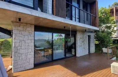 Casa moderna com vista deslumbrante para a lagoa – praia da ferrugem/sc