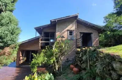 Casa com vista para a lagoa e piscina natural na encantada - garopaba/sc