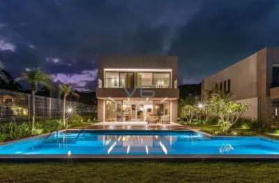 Casa alto padrão com 458m² privativos, 4 suítes, 4 vagas de garagem, na praia do estaleiro, balneário camboriú - sc.
