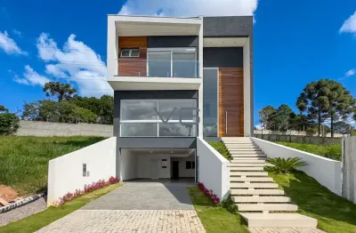 Casa alto padrão com 3 suítes, 350m² privativos, 5 vagas de garagem, no santa candida, curitiba - pr.