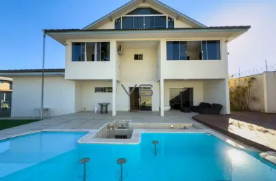 Casa em condomínio com 474 m² privativos, 4 suítes, 4 vagas de garagem, em santa felicidade, curitiba - pr.