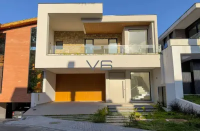 Casa alto padrão em condomínio com 3 suítes, 2 vagas de garagem, 261m² privativos, em santa felicidade, curitiba-pr.