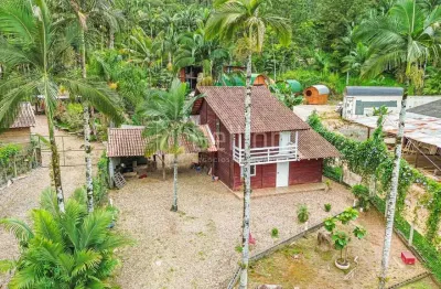 Casa à venda em rodeio no bairro kaspereit, com amplo terreno e área de festas