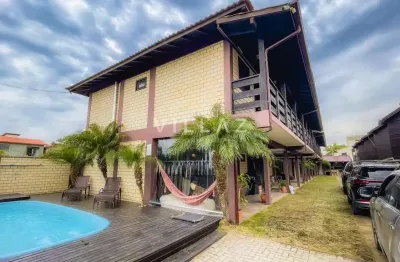 Casa com 4 quartos em condomínio fechado próximo à praia do rosa norte
