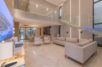 Mansão exclusiva no azur condomínio  lago uma residência de alto padrão projetada para oferecer sofisticação, conforto e tecnologia de ponta.
