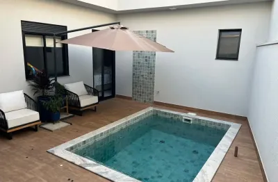 Linda casa térrea com piscina no condomínio jardim montreal