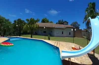 Chácara á venda no condomínio vale das laranjeiras no bairro itaici